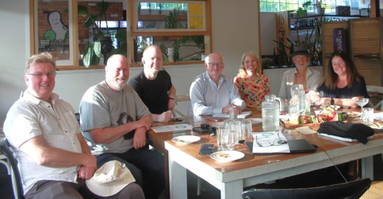 Members of the Bega Valley Data Collective sitting at a table in a restaurant.